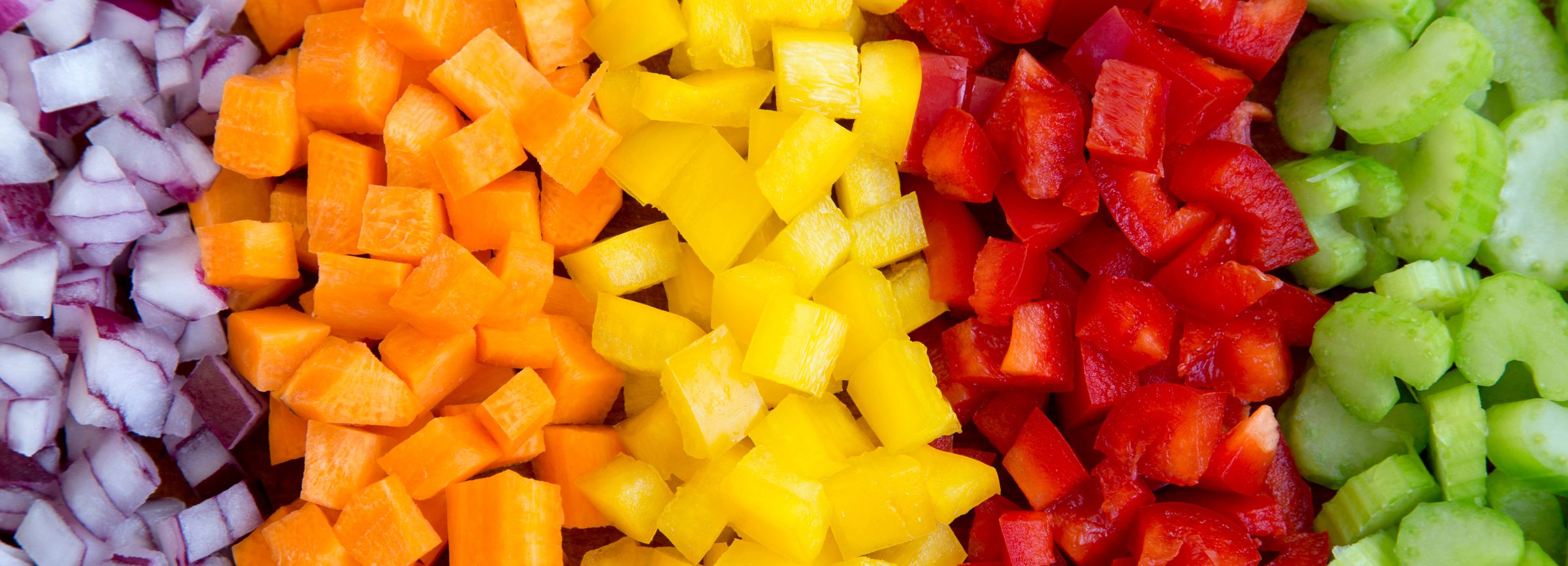 Freshly chopped red onion, carrot and yellow pepper